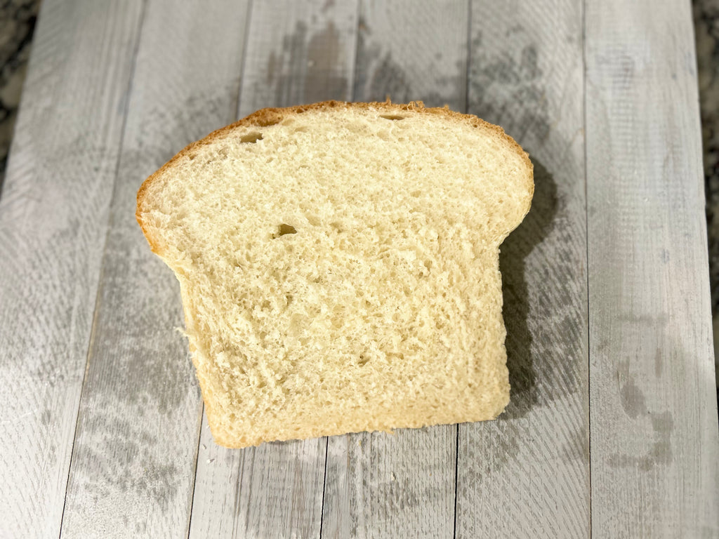 Soft, fluffy sandwich bread made fresh to order—perfect for toast, lunchboxes, and more. No preservatives. Custom-sliced on request.