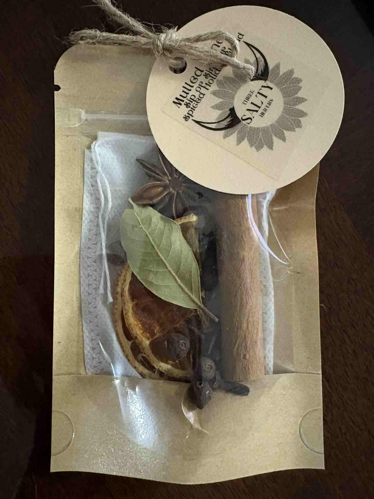 Mulled wine simmer pot sachet with dried orange, cinnamon, and star anise handcrafted by Three Salty Heifers in North Carolina.